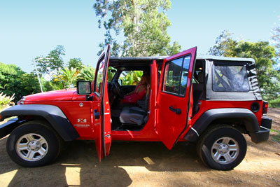 Doors open on a 4 door Jeep Wrangler in Hawaii